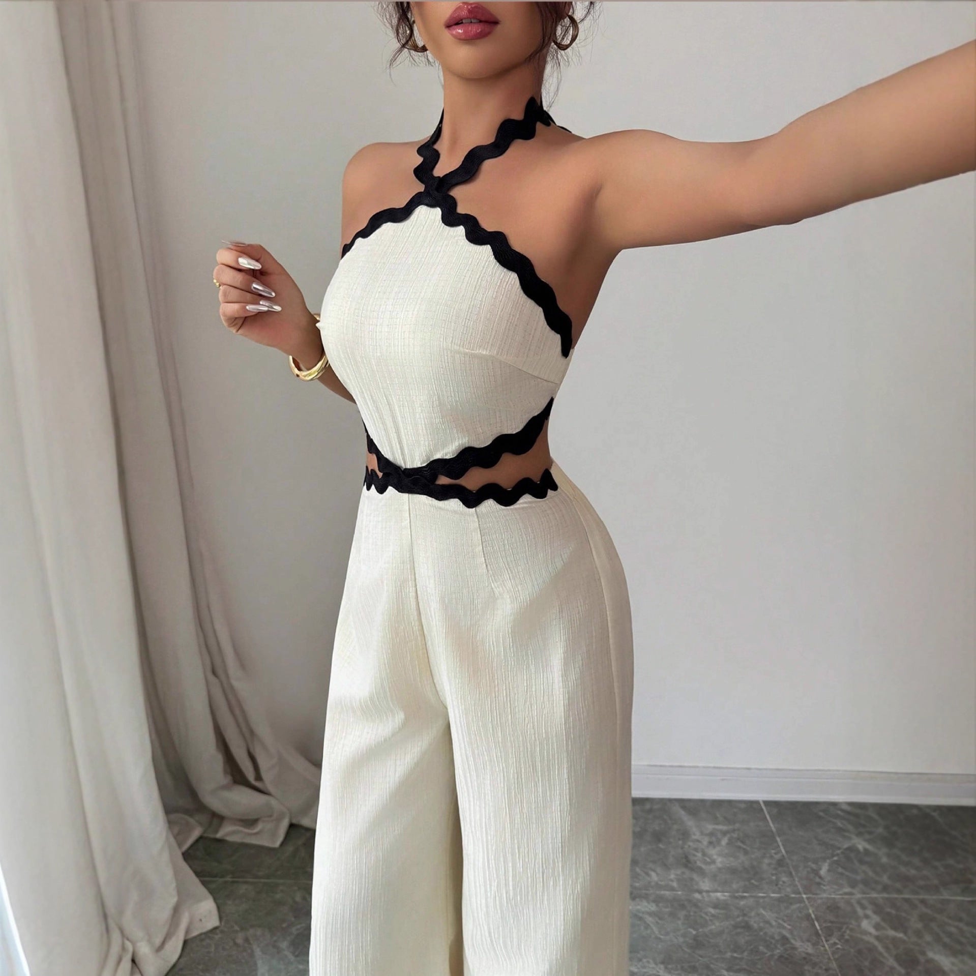 Women's Fashionable Wave Lace Texture Halter Stitching Hollow-out Jumpsuit